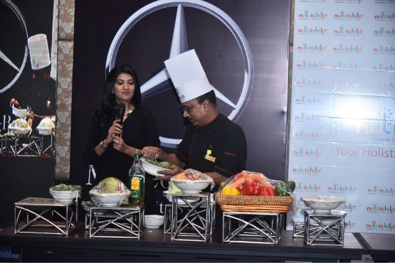 Shilpi Goel with the chef at healthy recipe workshop with Mercedes at Mayfair, Raipur