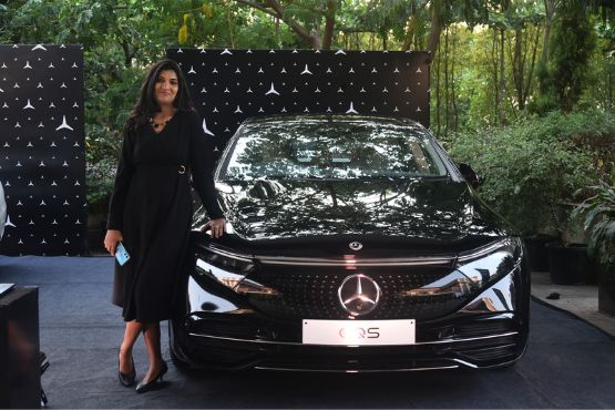 Shilpi Goel posing in front of mercedes car at healthy recipe workshop with Mercedes at Mayfair, Raipur