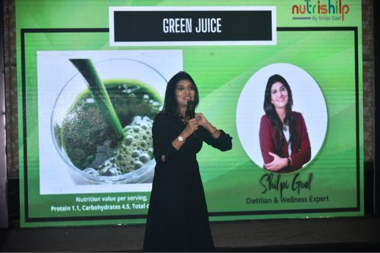 Shilpi Goel posing in front of healthy juice at healthy recipe workshop with Mercedes at Mayfair, Raipur