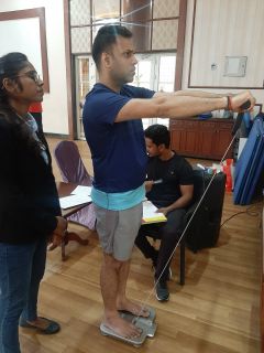 Participant getting his BMI done by Nutrishilp Team