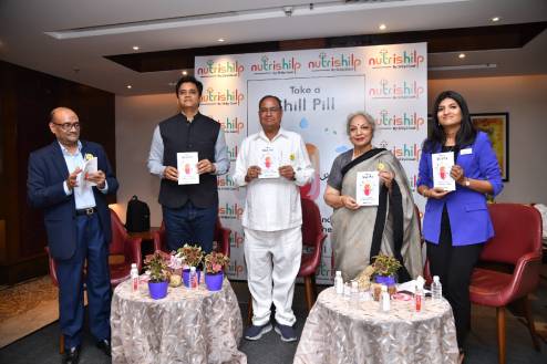 All the chief guests - Mr. GS Agrawal, Mr. Abhishek Singh, Mr. Gauri Shankar Agrawal, Mrs Kalpana Choudhary - showing the book during book launch event of 'Take a Shill Pill'